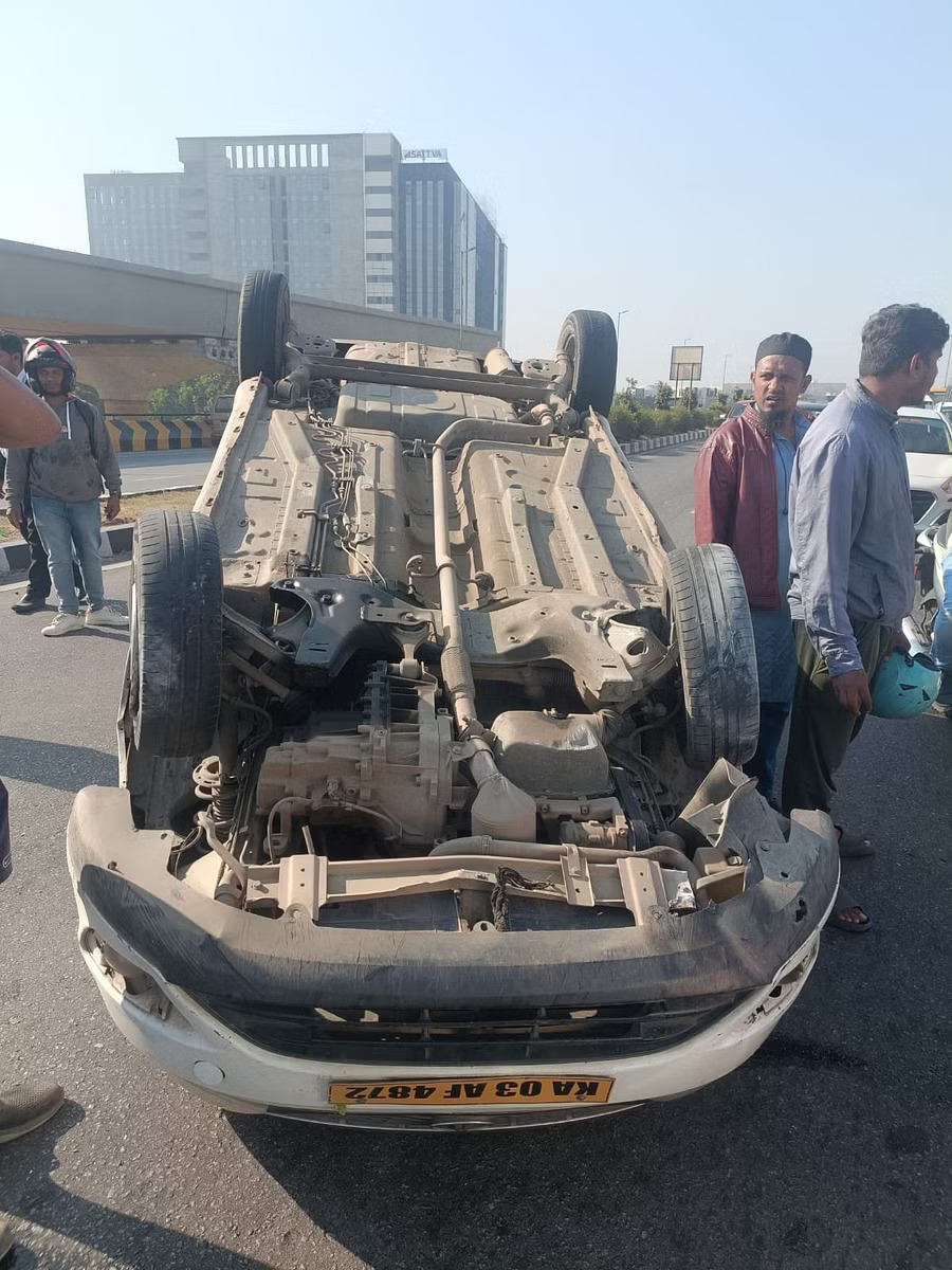 Car found toppled on Bagalur flyover