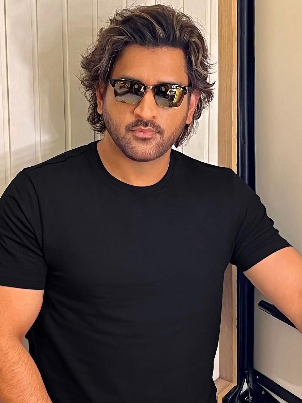 MS Dhoni flaunts new hairstyle pics go viral