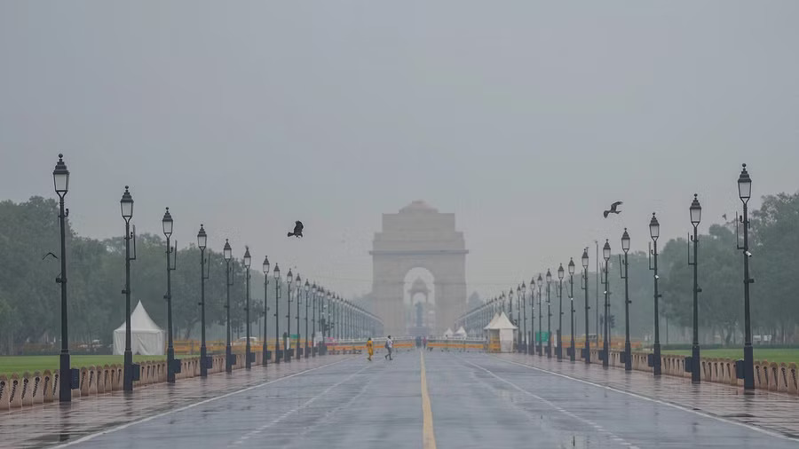 Delhis air quality improves light rain likely