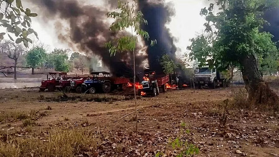 Naxalites torch 14 vehicles machines engaged in construction works in Chhattisgarh