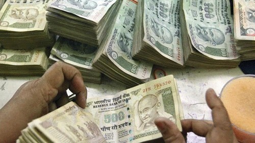 Rupee trades in narrow range against US dollar